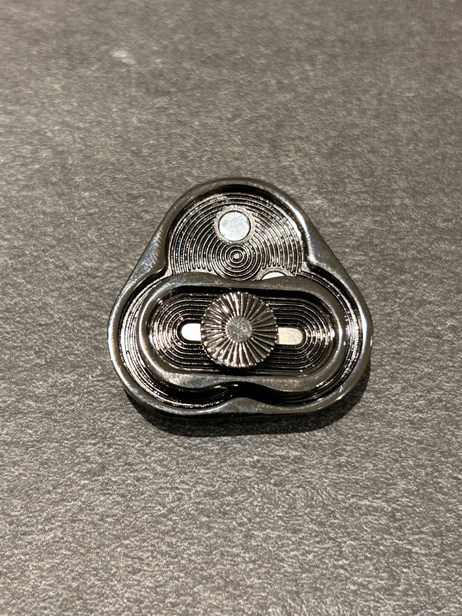 Billede af Black Metal Triangle Slider